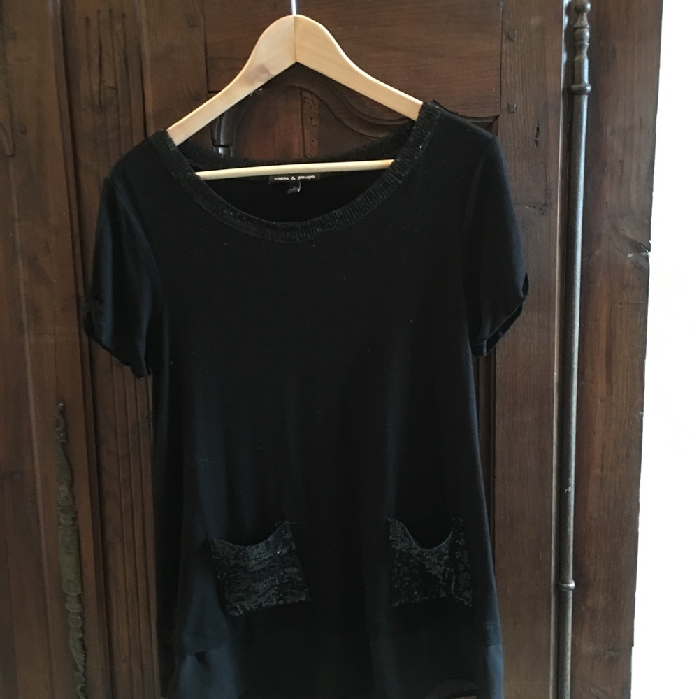 Long black T with sequins .